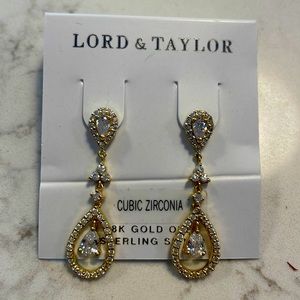 Cubic zirconia 18k gold over sterling silver earrings.